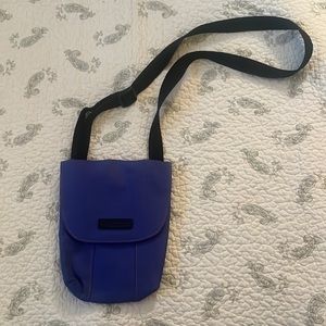 Timbuk2 purple nylon crossbody bag with pink stitching